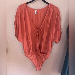 Free People rust bodysuit, size XS